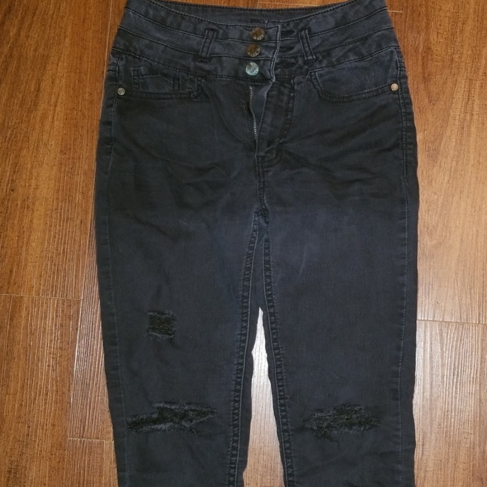 High waisted, black distressed jeans